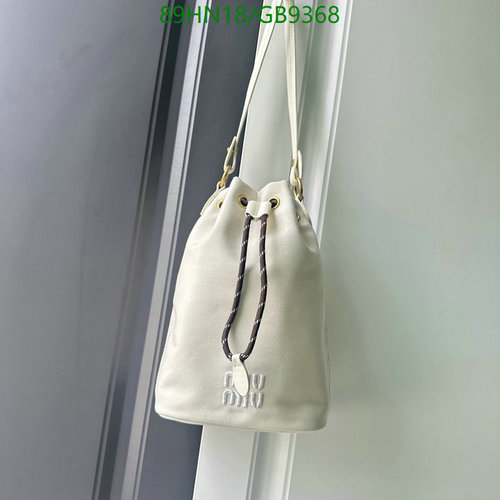 Miu Miu Women's Canvas & Leather Bucket Bag - Elegant & Versatile