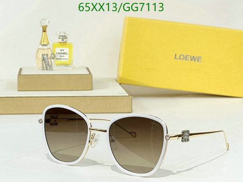 Loewe Luxury Oval Sunglasses for Women with Gradient Lenses - Elegant White & Gold