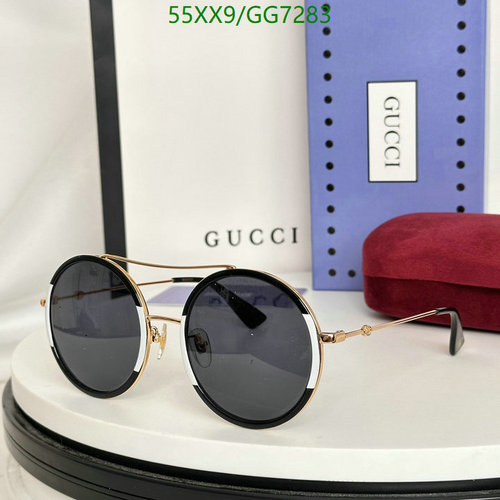 Gucci Round Frame Sunglasses with White and Black Acetate Trim