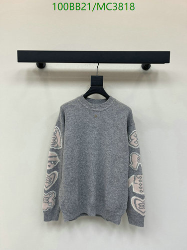 Chanel Cashmere Blend Long Sleeve Sweater with Unique Pattern Embellishments