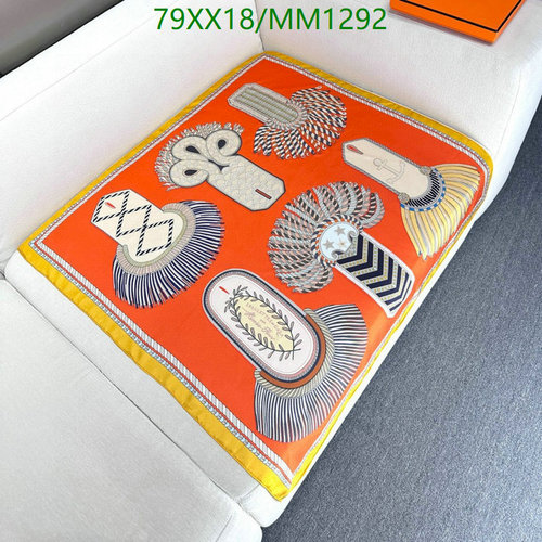 Hermès Silk Scarf: Vibrant Orange Design with Unique Military-Inspired Accents