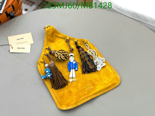 Miu Miu Genuine Leather Shoulder Bag with Tassel Charms - Stylish & Chic