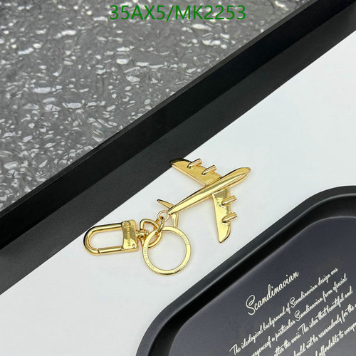 Louis Vuitton Airplane Key Pendant - Elegant Gold-Tone Keychain Charm