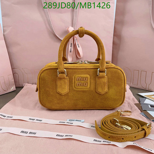 Miu Miu Calfskin Mini Bag with Adjustable Strap - Elegant and Versatile