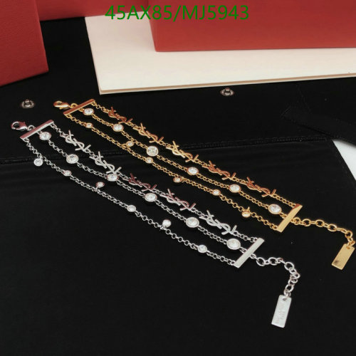 Yves Saint Laurent Gold and Silver Tone Crystal Embellished Charm Bracelet