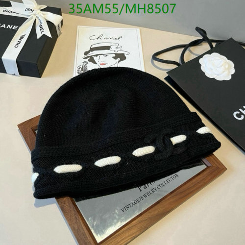 Elegant Chanel Black Knit Hat with White Accents - Warm and Stylish