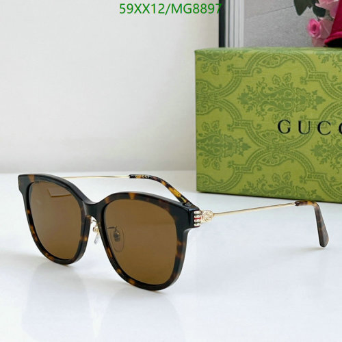 Gucci Women's Cat Eye Sunglasses Tortoise Frame with Gold-Tone Temples GG0897S