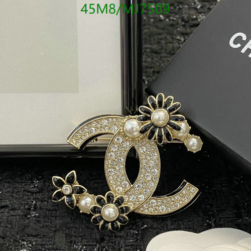 Chanel Brooch with Floral and Pearl Embellishments - Timeless Elegance