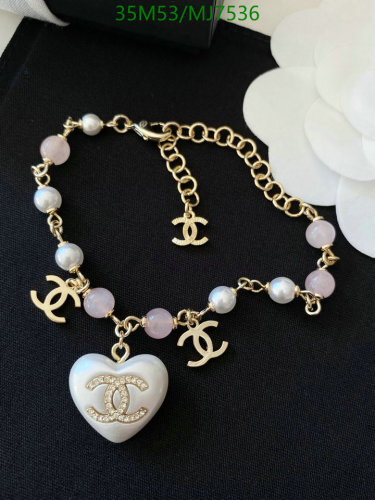 Elegant Chanell Gold-Tone Bracelet with Pearls and Heart Charm, MJ7536