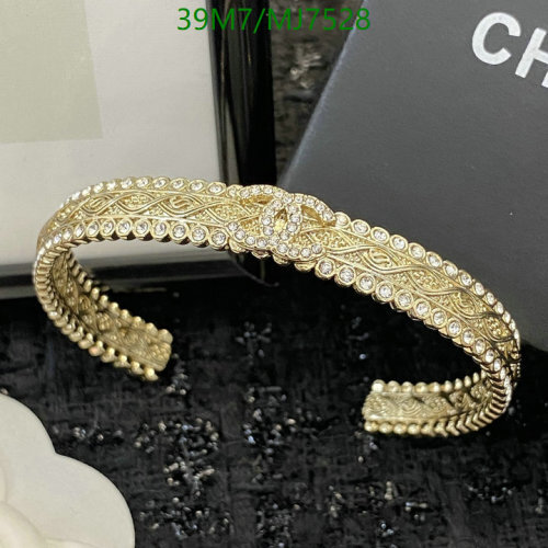 Elegant Gold-Tone Bangle Bracelet with Crystal Accents and Iconic CC Logo
