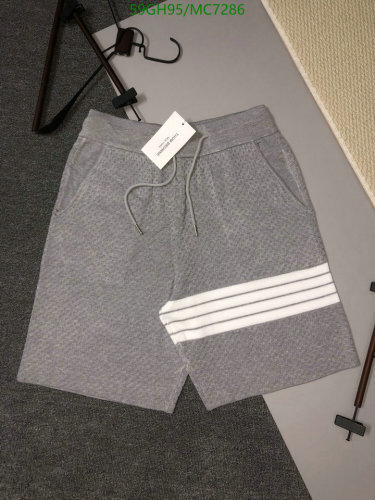 Thom Browne Men's Grey Knit Shorts with Signature Stripe Detail - Casual Comfort