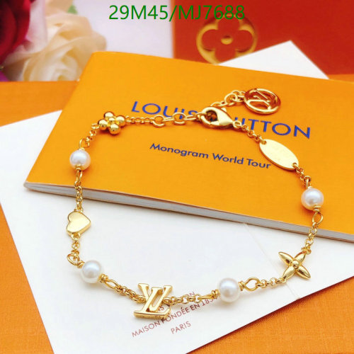 Louis Vuitton Monogram World Tour Gold-Tone Bracelet with Pearl Accents 6 Louis Vuitton Monogram World Tour Gold-Tone Bracelet with Pearl Accents