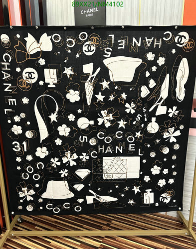 Elegant Chanel Silk Cashmere Scarf - Iconic Design, Luxurious Feel.