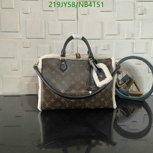 Louis Vuitton Monogram Empreinte Speedy Bandouliere 25 with Shearling