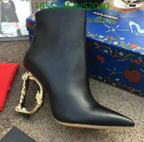 Dolce & Gabbana Leather Ankle Boots with Sculptural Heel - Women Shoes