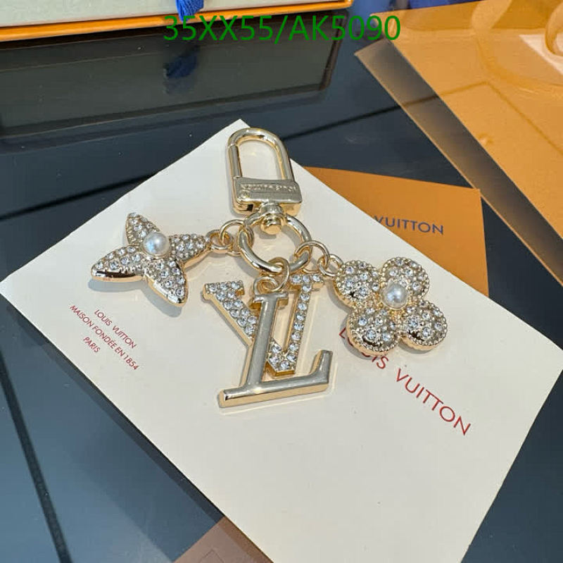 Louis Vuitton Key Chain Gold-Tone with Crystals and Charms, Elegant Accessory