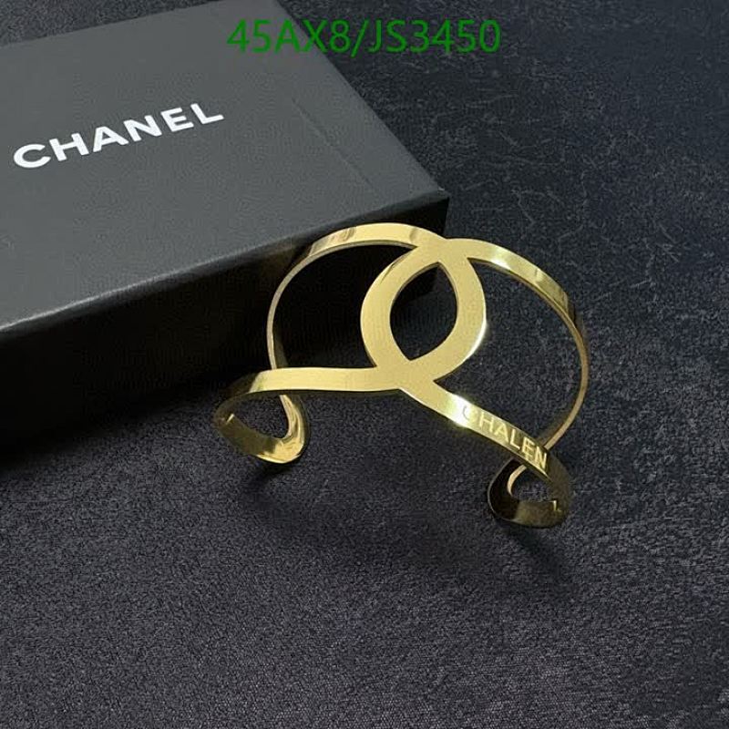 Elegant Chanel Gold-Tone Cuff Bracelet with Iconic CC Logo, JS3450