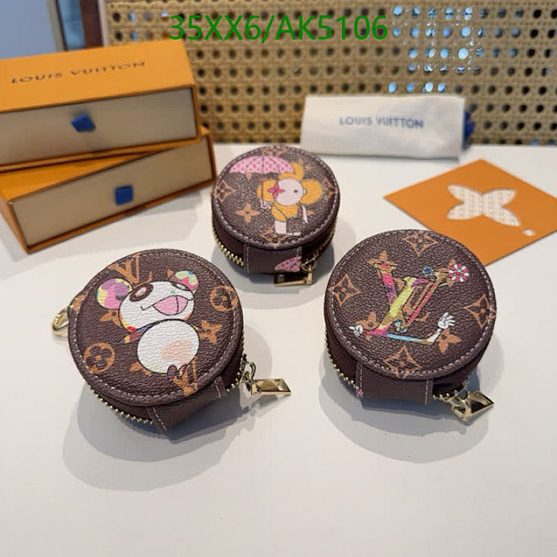 Louis Vuitton Key Pendants with Cartoon Prints, Designer Charm, and Luxury Appeal
