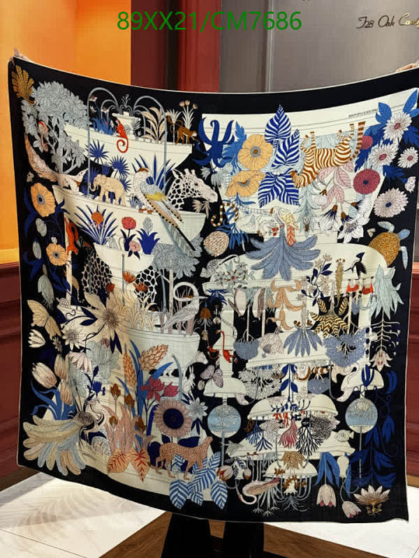 Elegant Hermès Silk Cashmere Scarf with Exotic Fauna and Flora Design