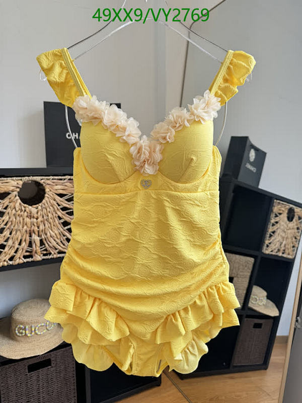 Elegant Yellow Ruffled One-Piece Swimsuit with Floral Embellishments