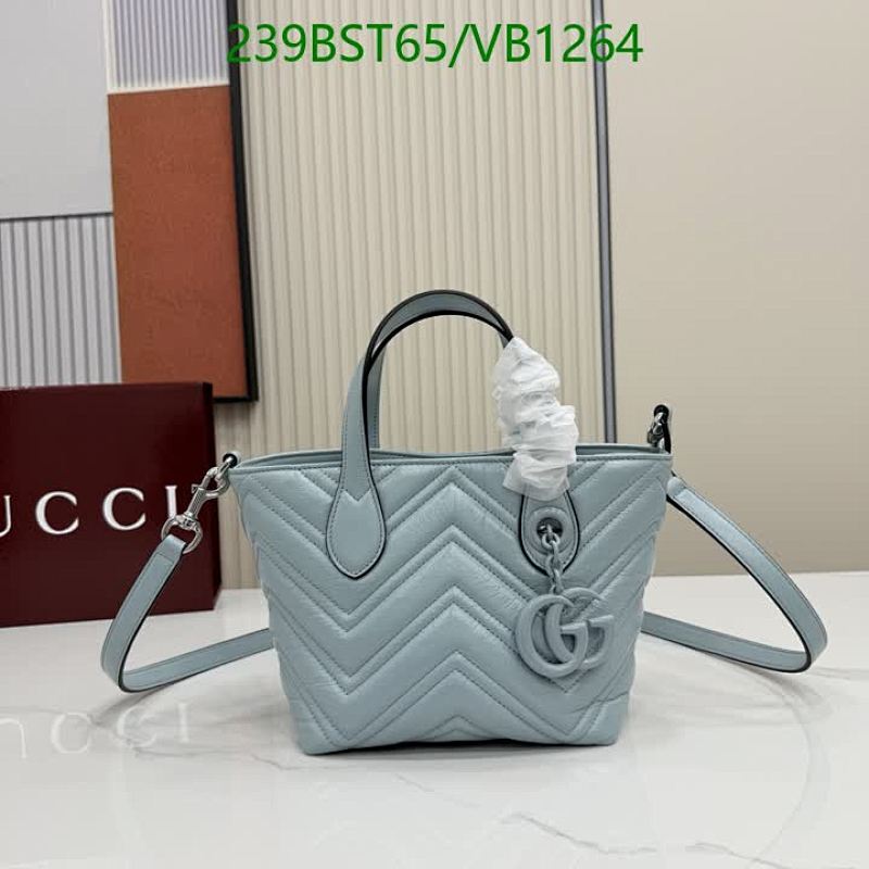 Products 47 Gucci GG Marmont Small Matelassé Top Handle Bag in Light Blue Leather