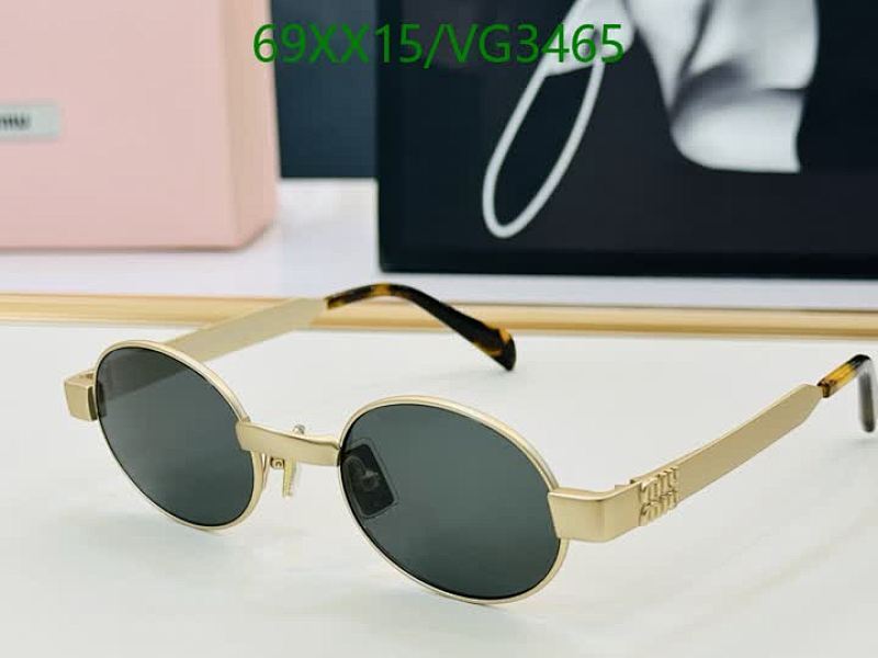 Stylish Miu Miu Oval Sunglasses for Women - Gold Frame, Dark Lenses