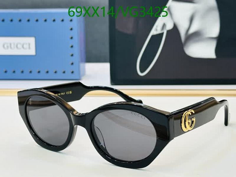 Gucci Women's Stylish Black Cat-Eye Sunglasses with Gold GG Logo