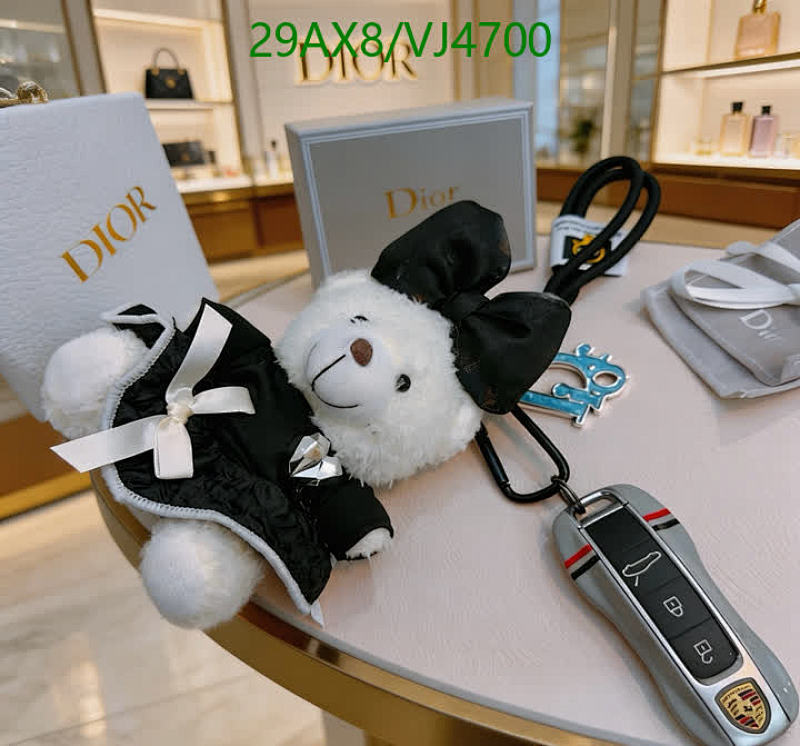 Dior Charm Bear Keychain - Elegant Black & White Plush with Bow Accent