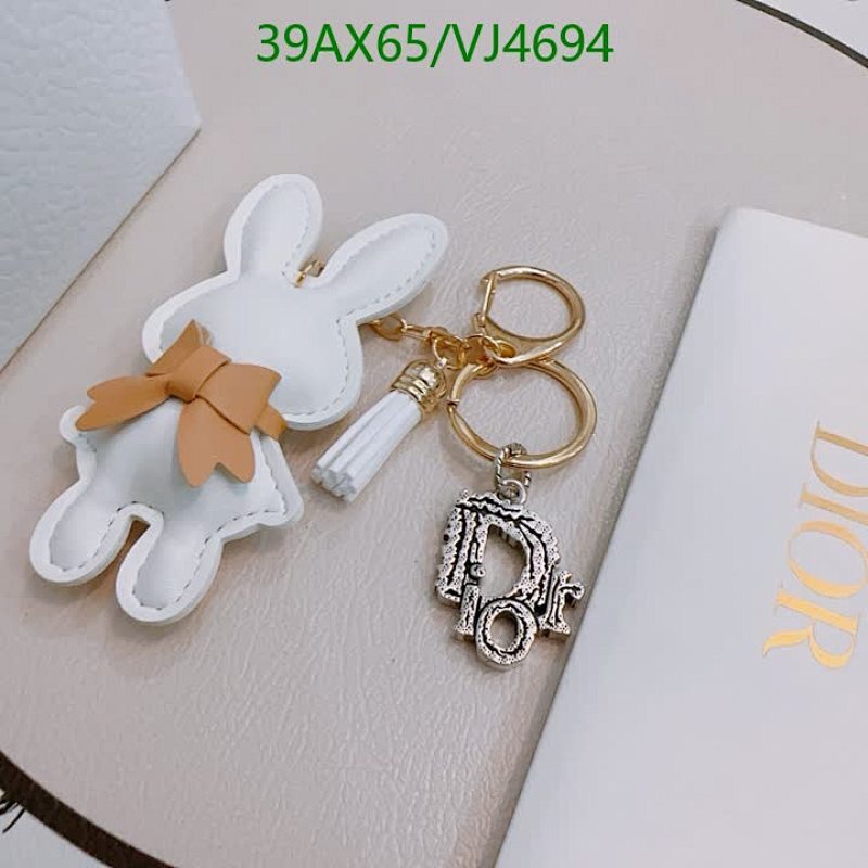 Dior Charm Bunny Keychain - Elegant White Leatherette & Gold-Tone Hardware