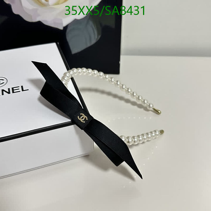 Chanel Pearl Embellished Headband with Black Bow Accent