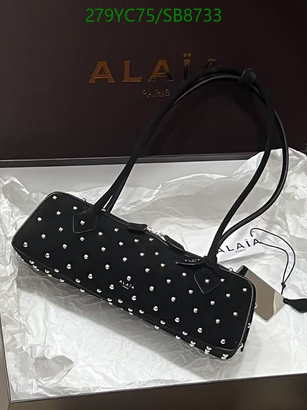 ALAIA Paris Studded Black Leather Cylinder Baguette Shoulder Bag